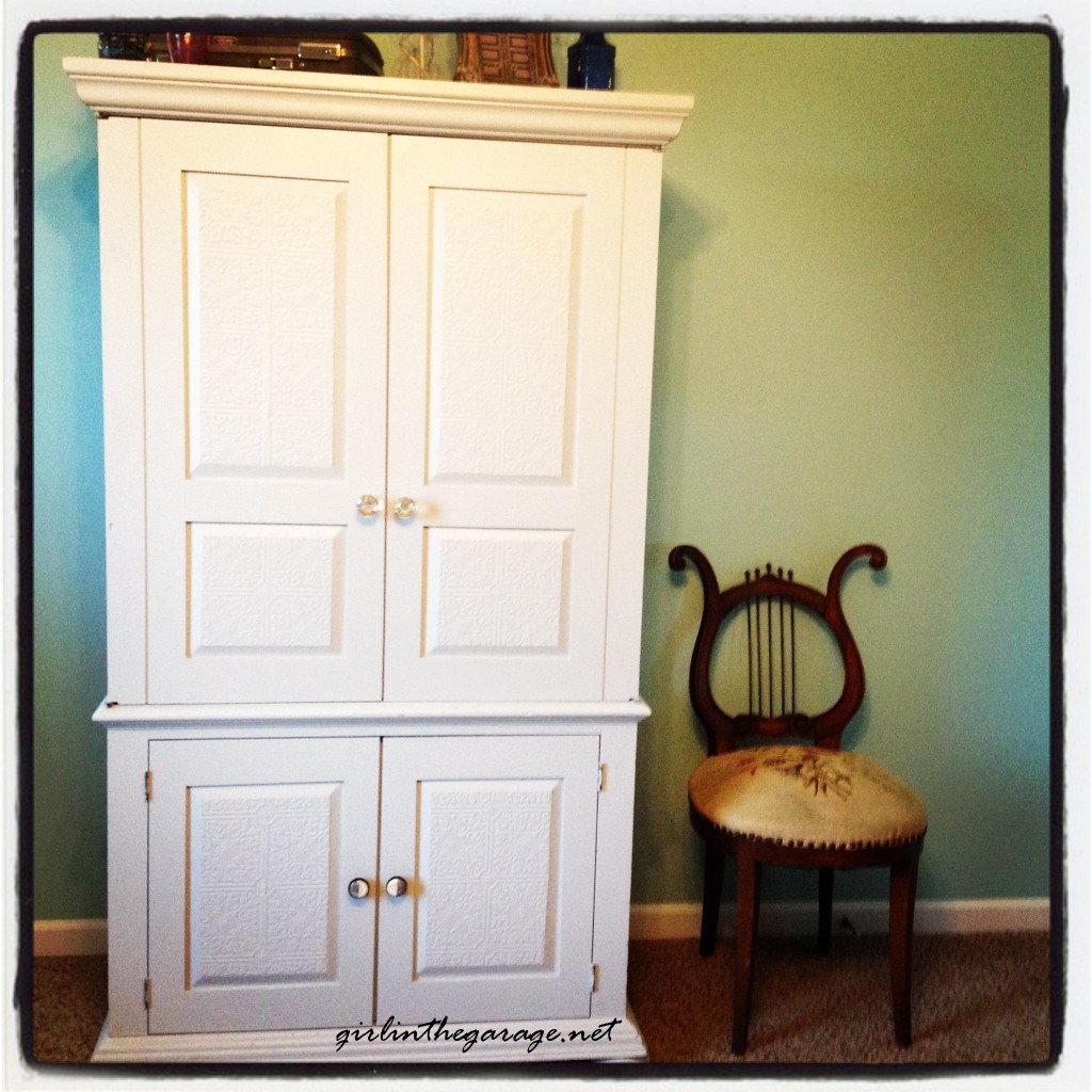 Drab-to-Fab Armoire Makeover: New paint, textured wallpaper, and a fabulous pop of color inside! I girlinthegarage.net