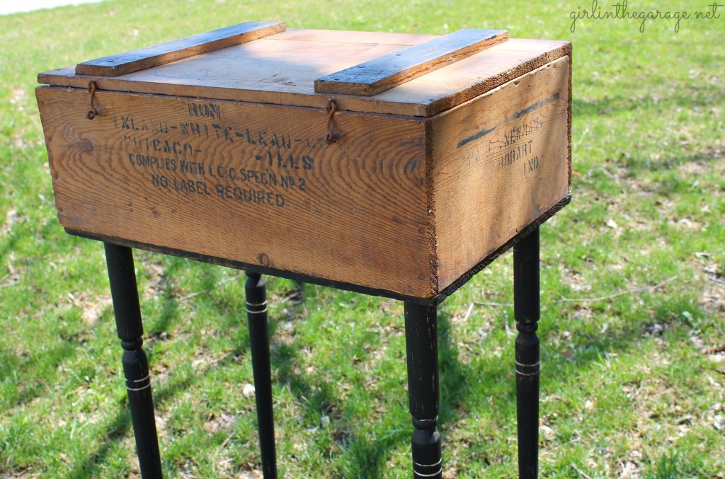 Upcycled old crate to "farmhouse chic" side table by adding legs and paint.  By Girl in the Garage