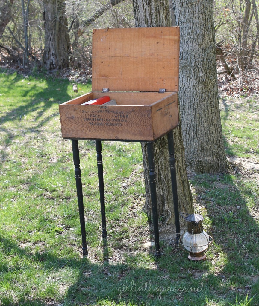 Upcycled old crate to "farmhouse chic" side table by adding legs and paint.  By Girl in the Garage