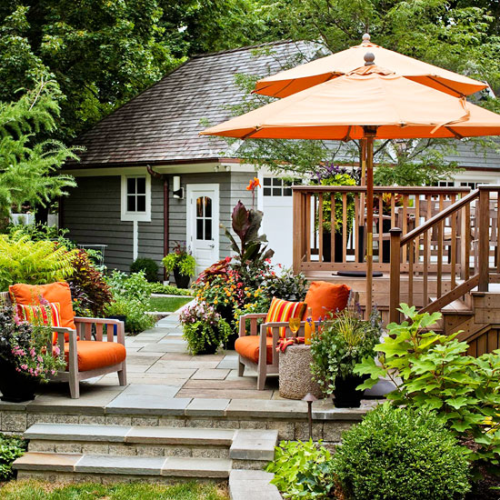 Tiered deck and patio {via Better Homes & Gardens}