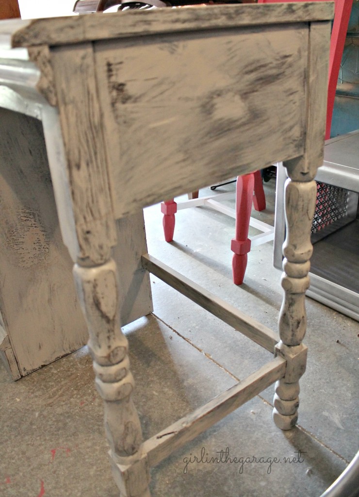 Vintage desk makeover by Girl in the Garage.  An old tattered yard sale desk was repaired and revived into something definitely worthy of bringing inside the house!  