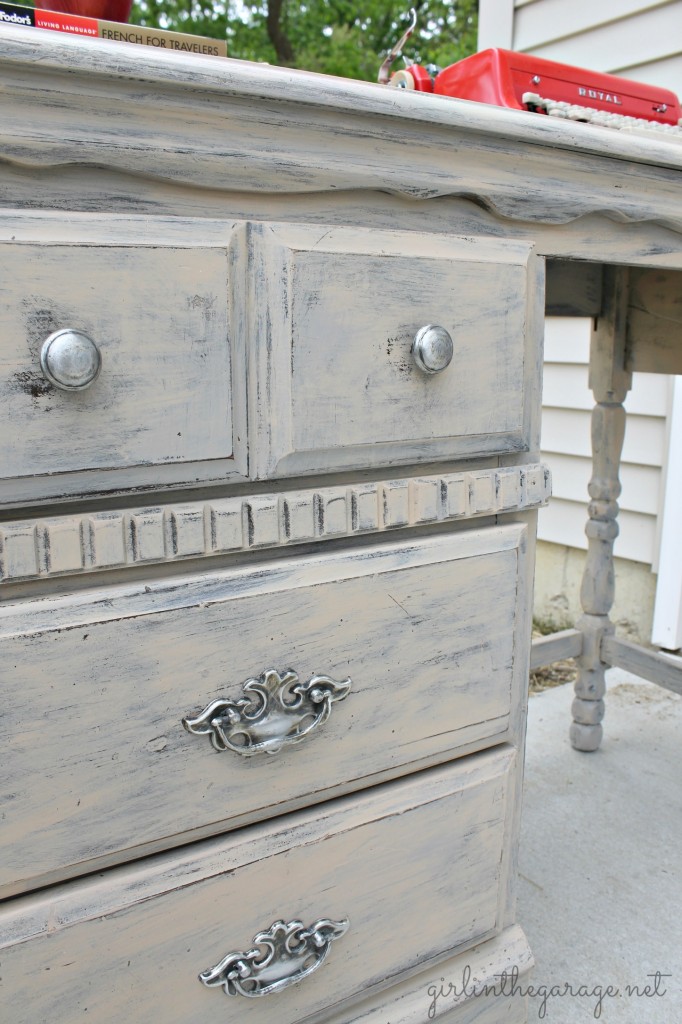 Vintage desk makeover by Girl in the Garage.  An old tattered yard sale desk was repaired and revived into something definitely worthy of bringing inside the house!  