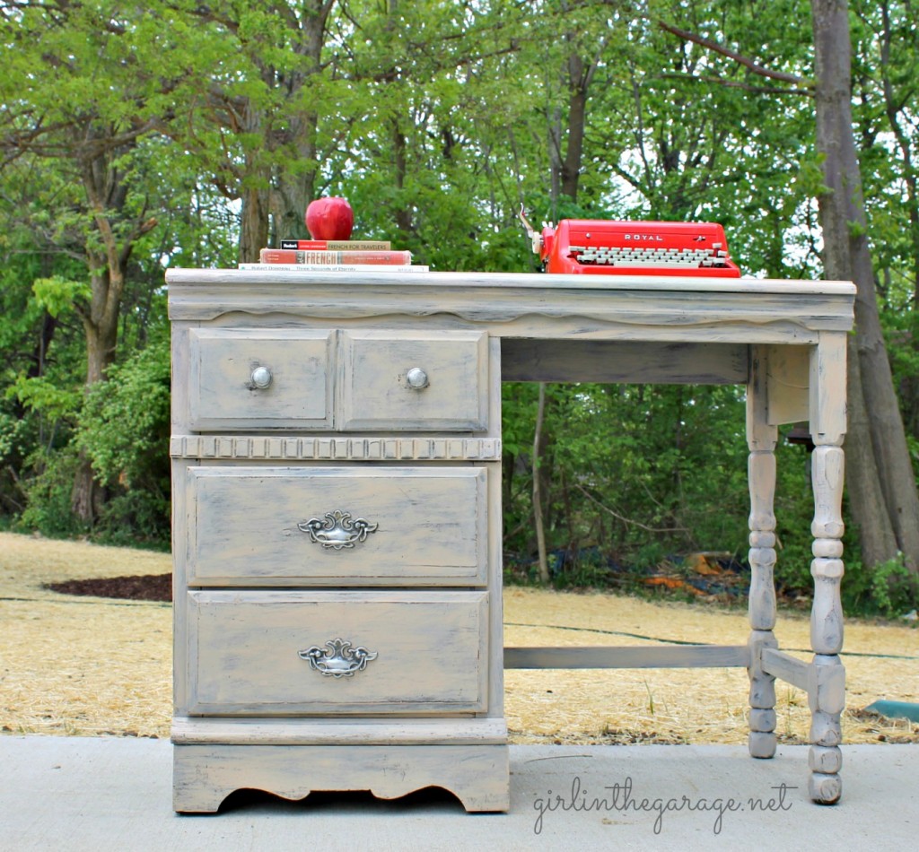 Vintage desk makeover by Girl in the Garage.  An old tattered yard sale desk was repaired and revived into something definitely worthy of bringing inside the house!  