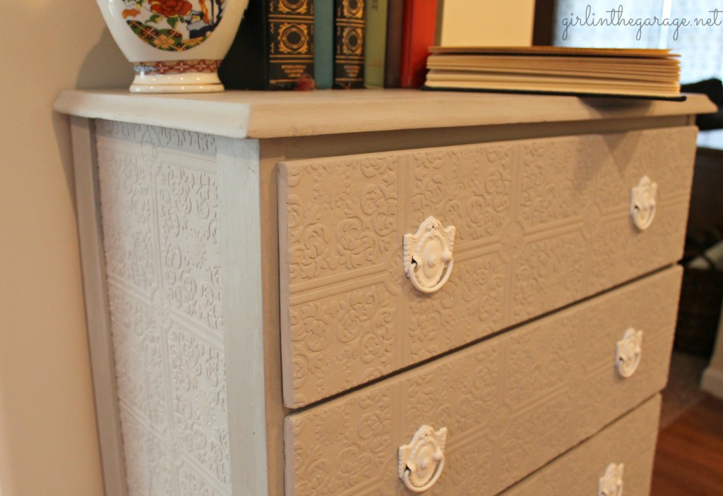 A plain dresser gets a makeover with paintable wallpaper, Annie Sloan Chalk Paint, and spray paint.