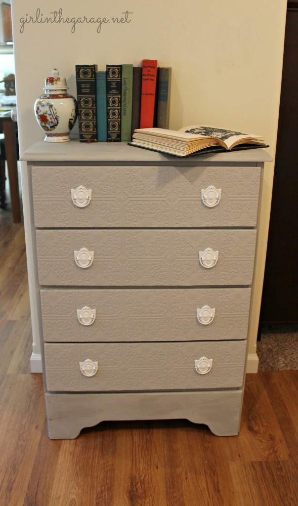 A plain dresser gets a makeover with paintable wallpaper, Annie Sloan Chalk Paint, and spray paint.