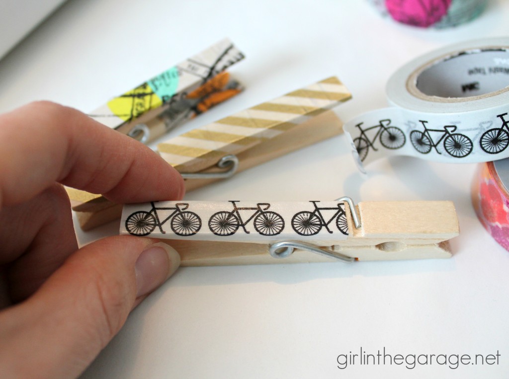 Add some personality to ordinary clips and magnets with washi tape!  girlinthegarage.net