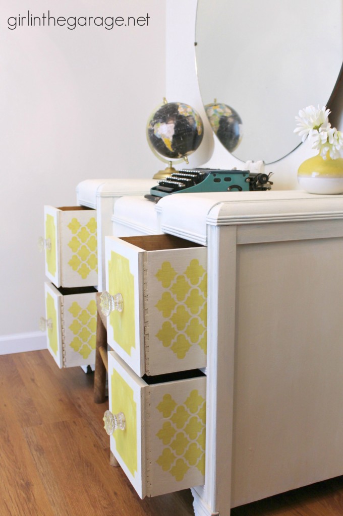 Bright white and yellow waterfall vanity makeover with Annie Sloan Chalk Paint and stenciled peekaboo drawers. Painted furniture ideas by Girl in the Garage