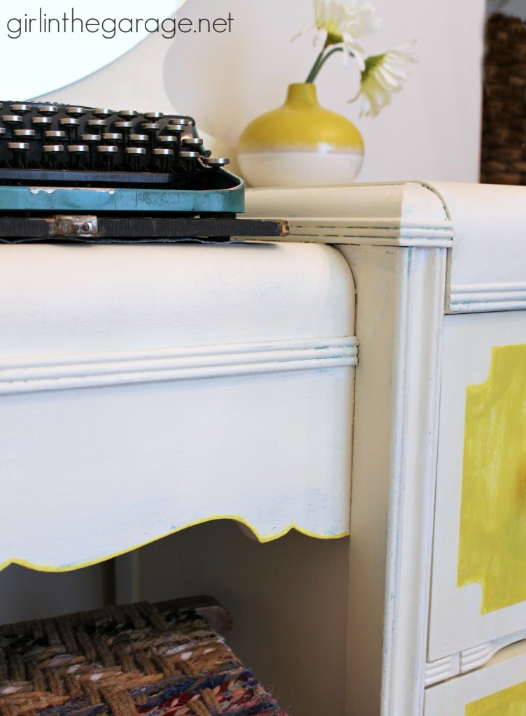 Bright white and yellow waterfall vanity makeover with Annie Sloan Chalk Paint and stenciled peekaboo drawers. Painted furniture ideas by Girl in the Garage