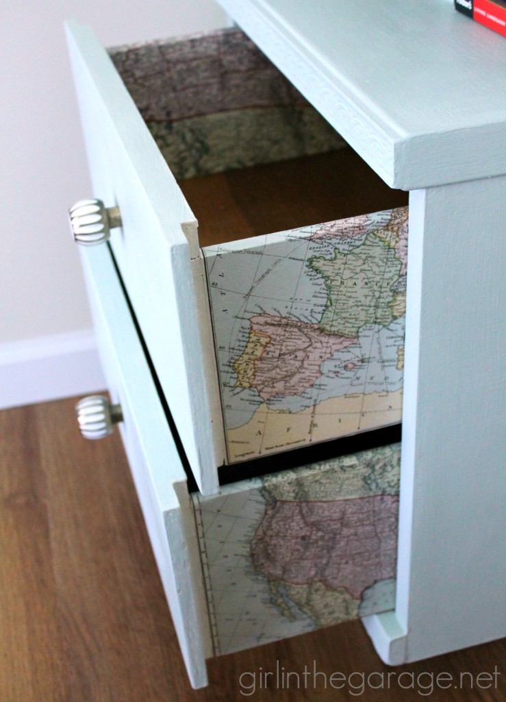 Decoupaged Map Table: Chalk Paint, Mod Podge, and maps.  "Travel" themed furniture makeover day - girlinthegarage.net