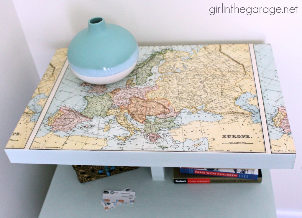 Decoupaged Map Table: Chalk Paint, Mod Podge, and maps.  "Travel" themed furniture makeover day - girlinthegarage.net