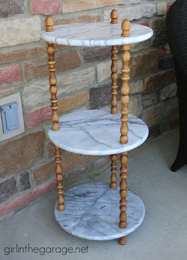 BEFORE: A marble table is updated with Graphite Chalk Paint on wooden spindles.  girlinthegarage.net