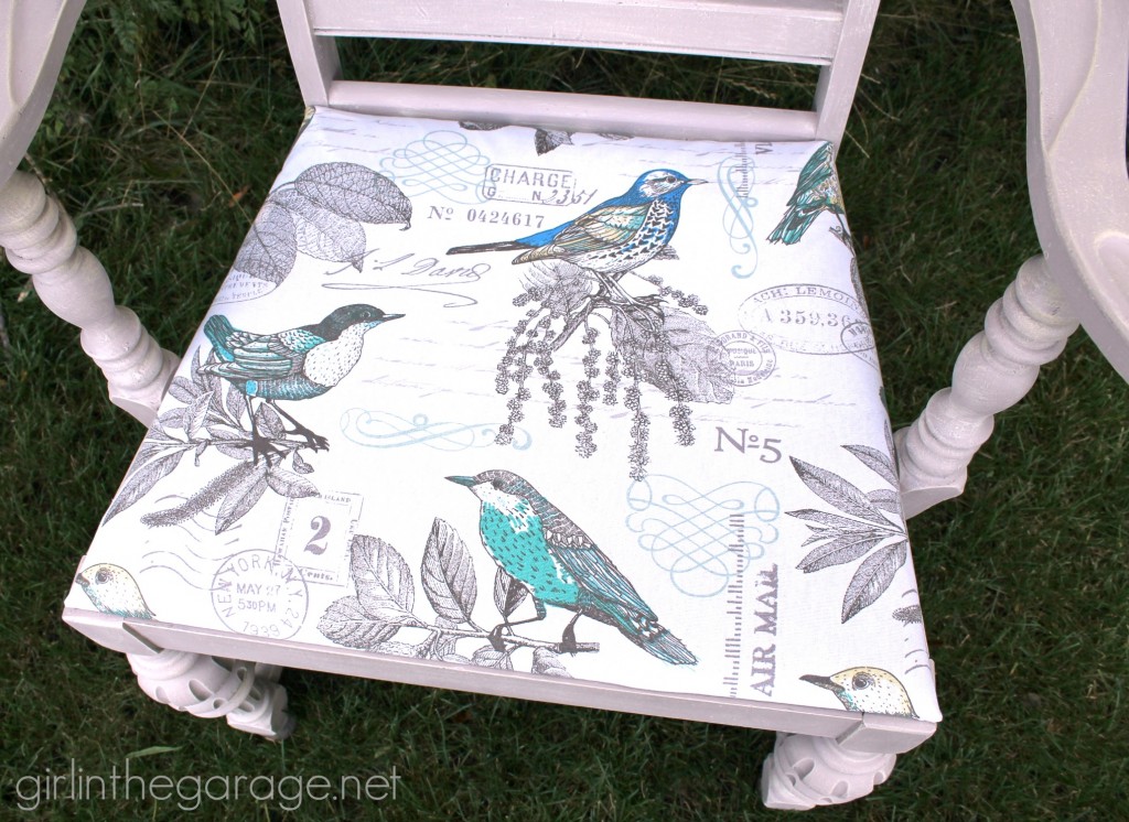 A vintage chair makeover: boring brown to beachy birds. Themed Furniture Makeover Day- see 9 "numbers" themed furniture makeovers.  girlinthegarage.net