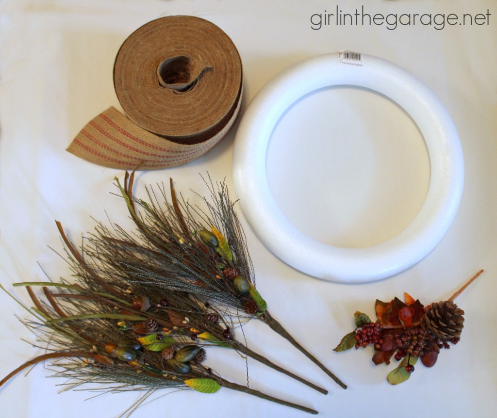 How to make a DIY fall wreath with burlap and nature-inspired sprigs.  girlinthegarage.net