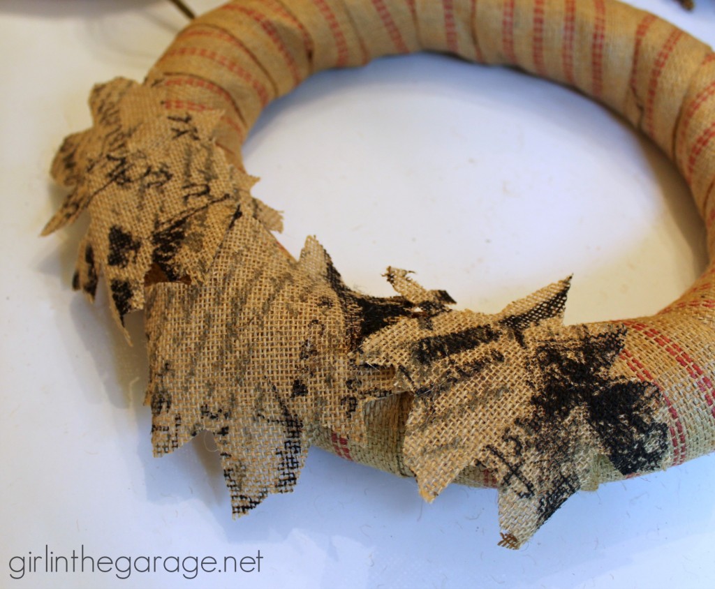 How to make a DIY fall wreath with burlap and nature-inspired sprigs.  girlinthegarage.net