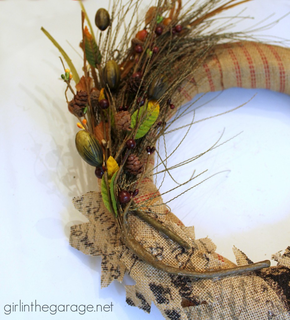 How to make a DIY fall wreath with burlap and nature-inspired sprigs.  girlinthegarage.net