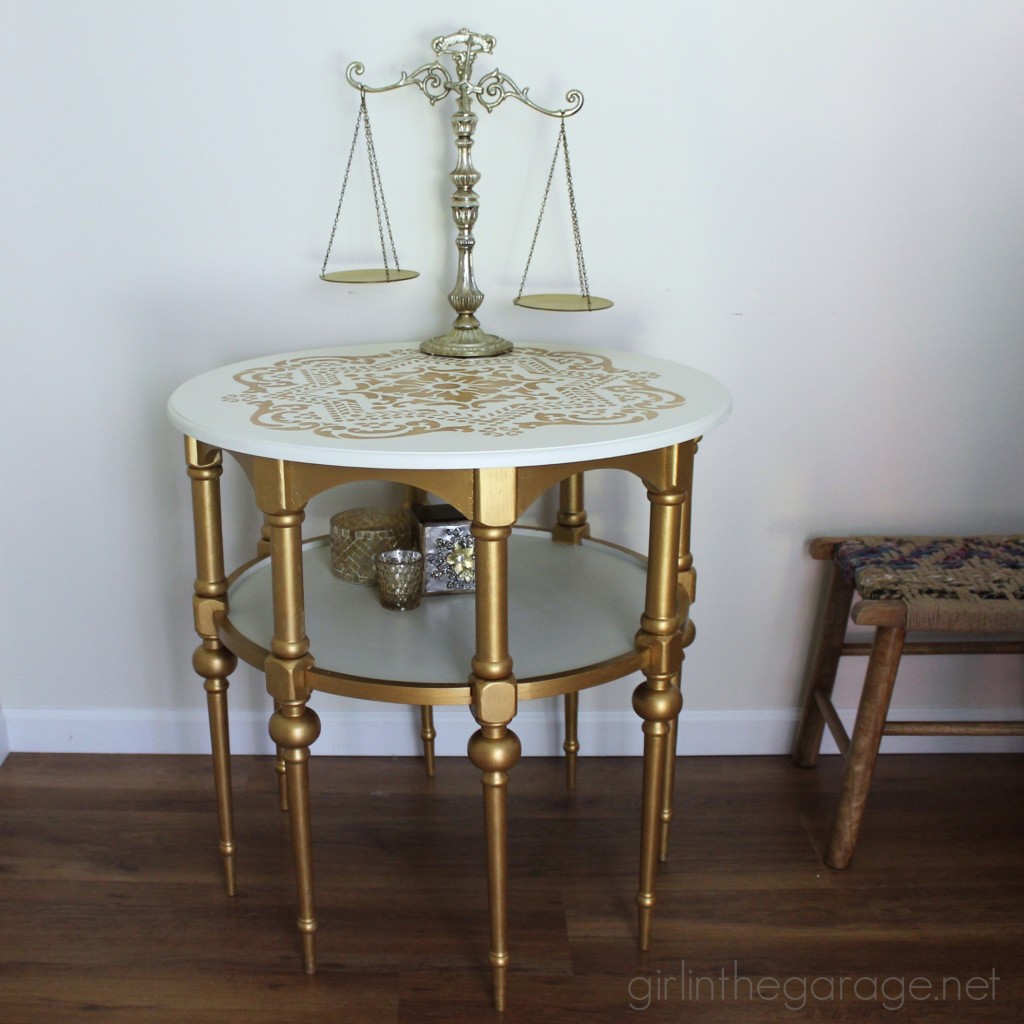 A stunning stenciled table makeover in metallic gold and white for Themed Furniture Makeover Day.   girlinthegarage.net