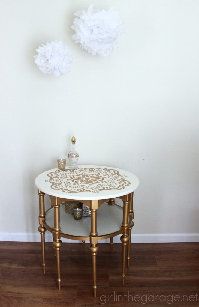 A stunning stenciled table makeover in metallic gold and white for Themed Furniture Makeover Day.   girlinthegarage.net