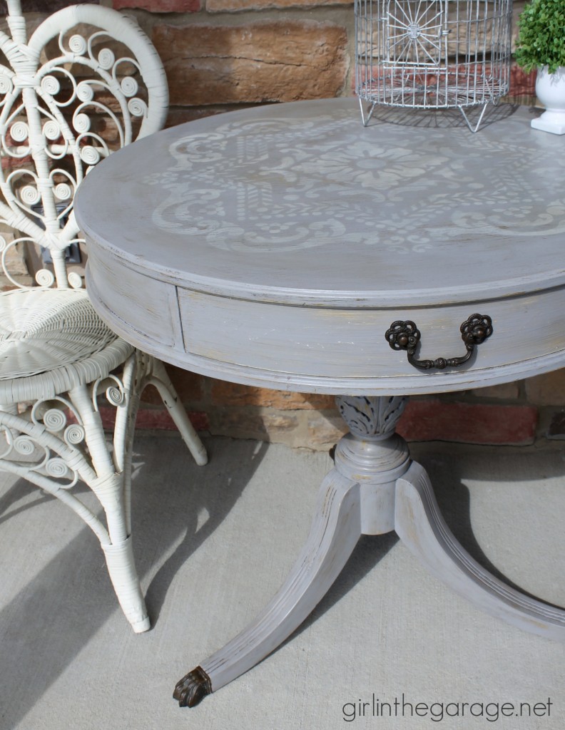 How to update an old table with a fabulous stencil and layered paint technique.  girlinthegarage.net