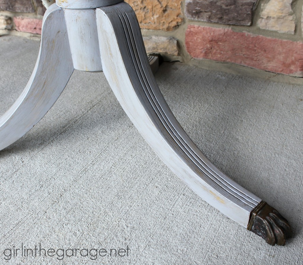 How to update an old table with a fabulous stencil and layered paint technique.  girlinthegarage.net