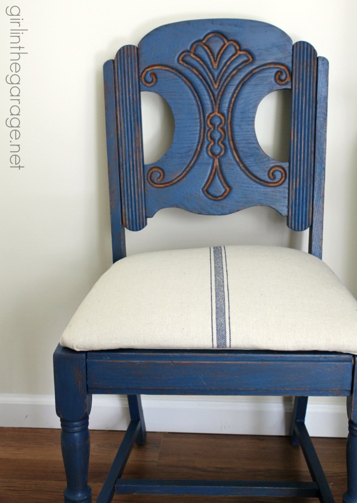 See how an outdated vintage chair got a French Country Chic makeover with new paint and grain sack fabric.  girlinthegarage.net