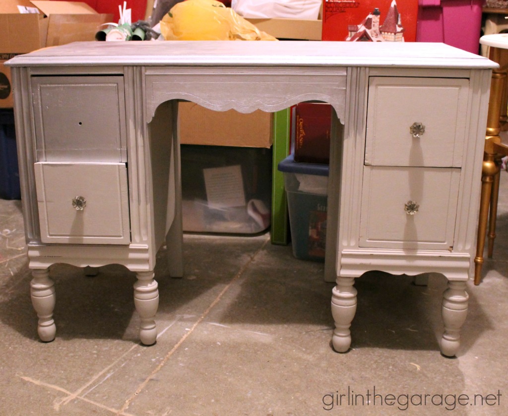 A vintage vanity gets a bright makeover for a little girl.  Custom pink color from Annie Sloan Chalk Paint.  girlinthegarage.net