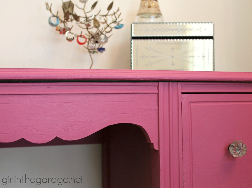 A vintage vanity gets a bright makeover for a little girl.  Custom pink color from Annie Sloan Chalk Paint.  girlinthegarage.net