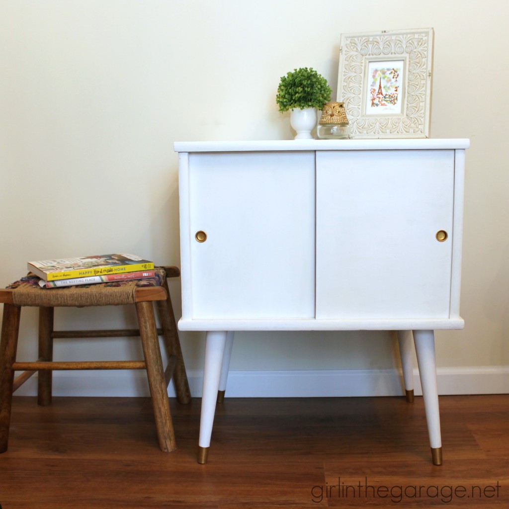 A midcentury table makeover with a surprise touch of whimsey inside.  girlinthegarage.net