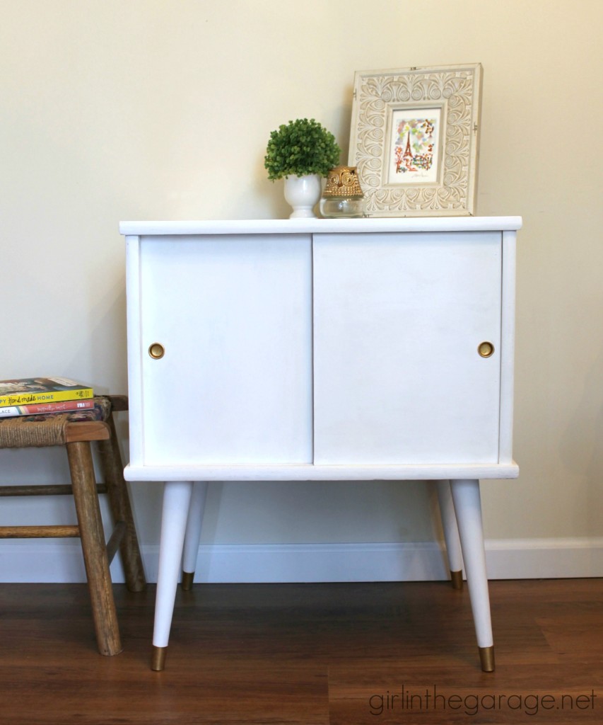 A midcentury table makeover with a surprise touch of whimsey inside.  girlinthegarage.net