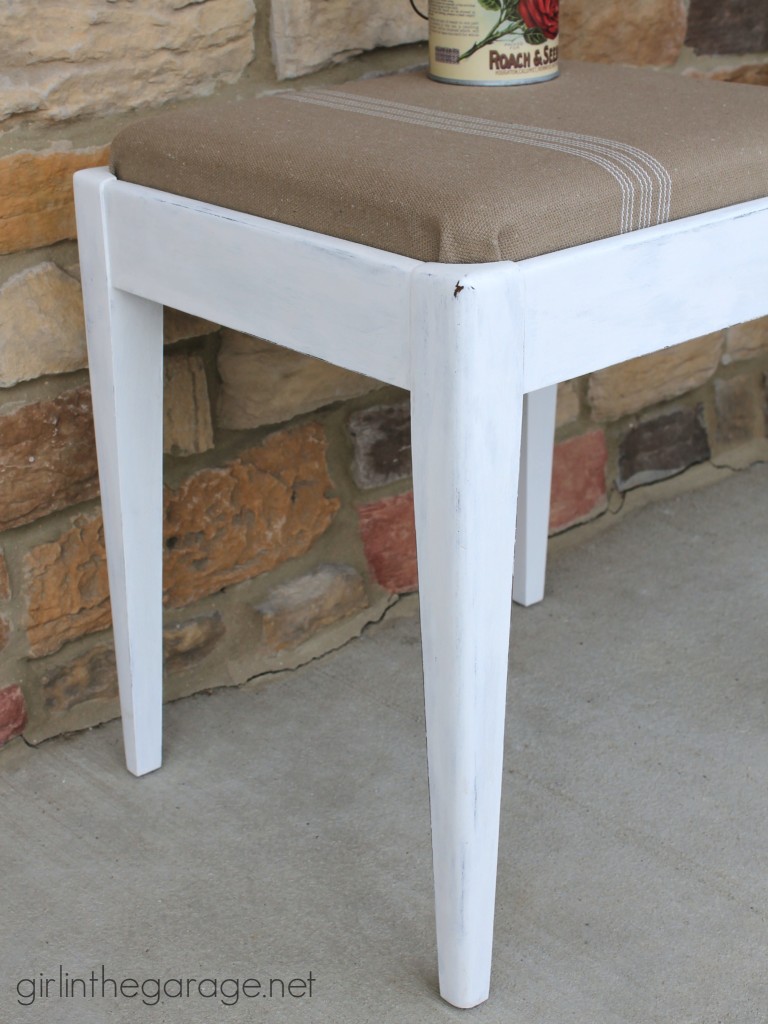 See how a plain Goodwill stool was given a vintage farmhouse makeover.  girlinthegarage.net