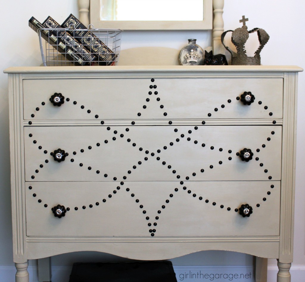 See how a dated vanity is transformed with Chalk Paint, nailhead trim, and beautiful new knobs. girlinthegarage.net