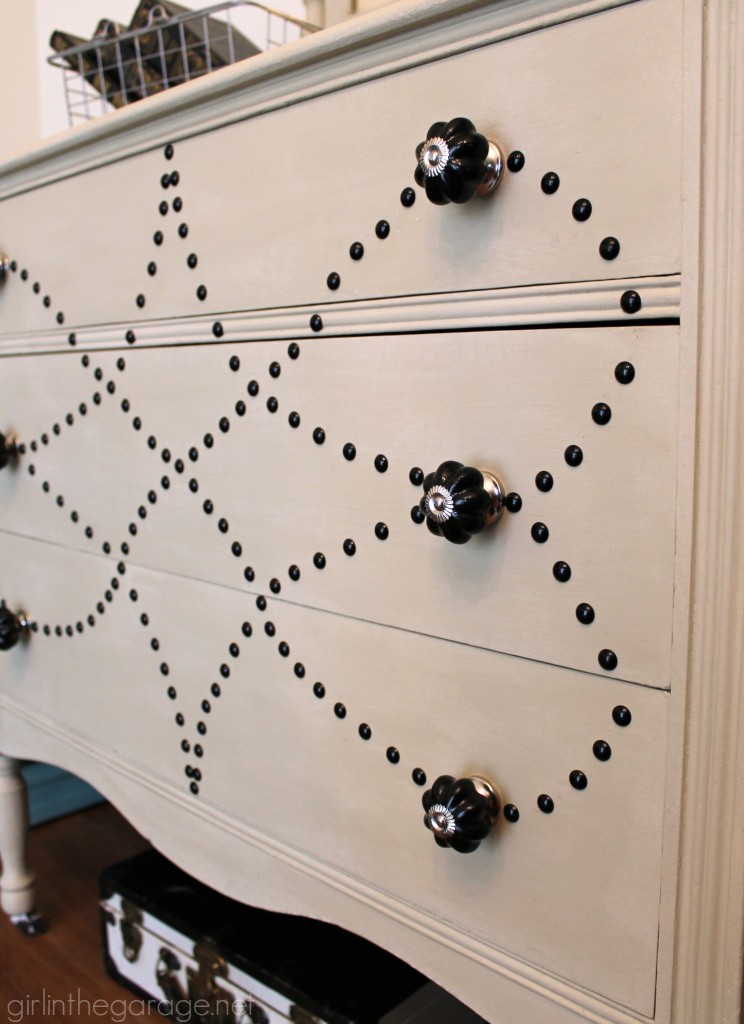 See how a dated vanity is transformed with Chalk Paint, nailhead trim, and beautiful new knobs. girlinthegarage.net