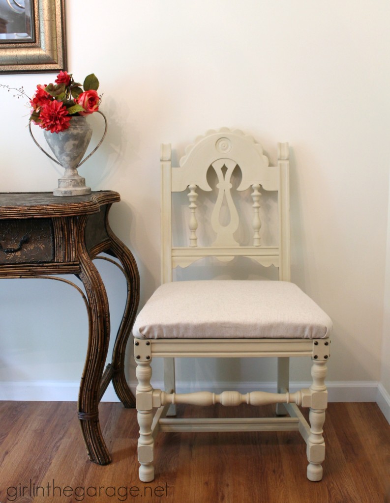 DIY Chair Makeover - How a bright vintage chair was toned down with Chalk Paint and new fabric.  girlinthegarage.net