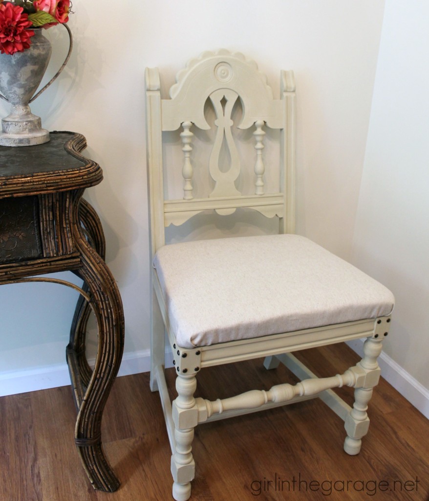 DIY Chair Makeover - How a bright vintage chair was toned down with Chalk Paint and new fabric.  girlinthegarage.net