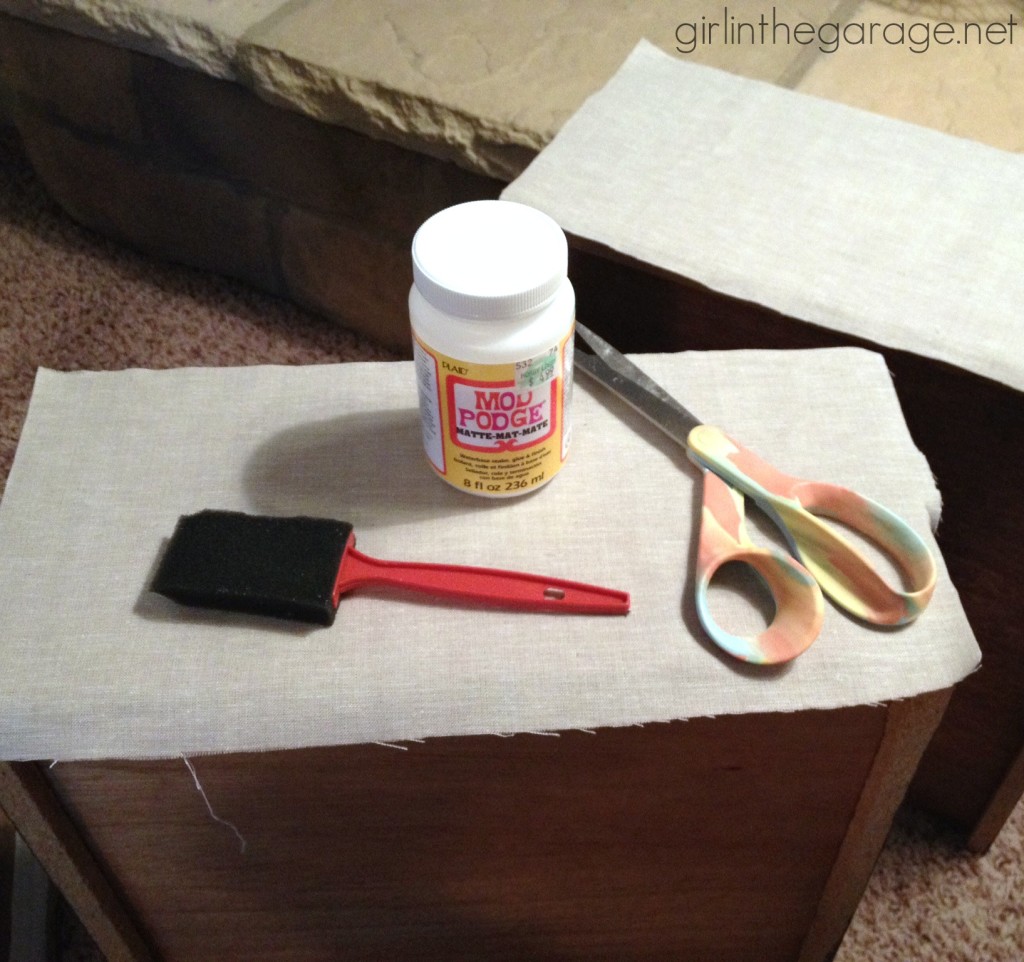 Learn how to upcycle two nightstands into Pottery Barn inspired trunk bedside tables with easy DIY leather pulls. By Girl in the Garage