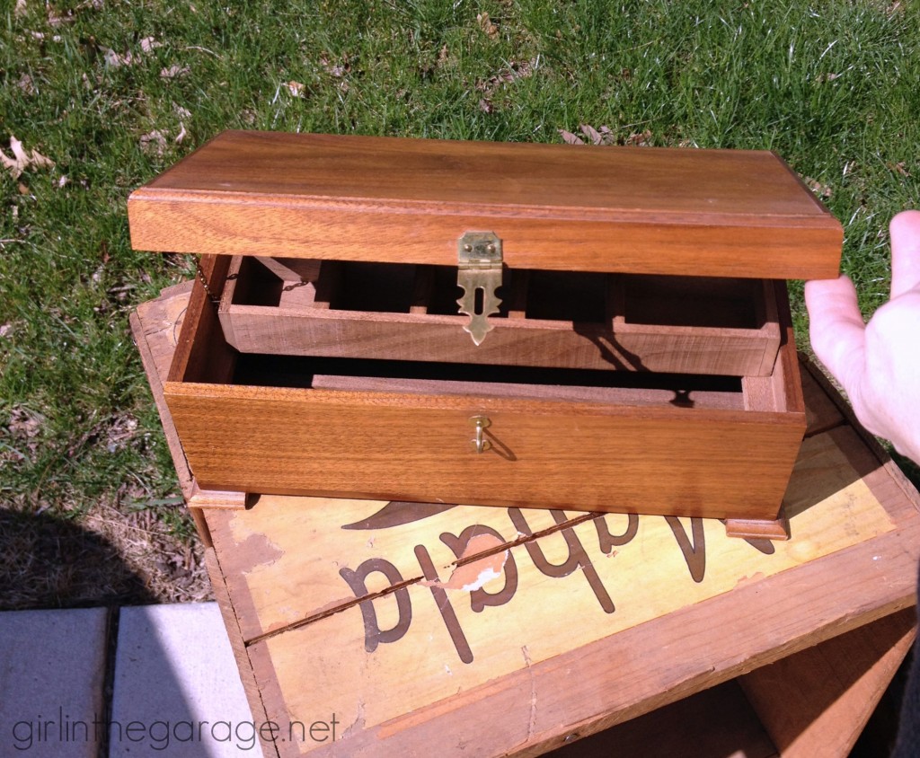 Metallic paint and a Paris stencil glam up a yard sale jewelry box.  girlinthegarage.net