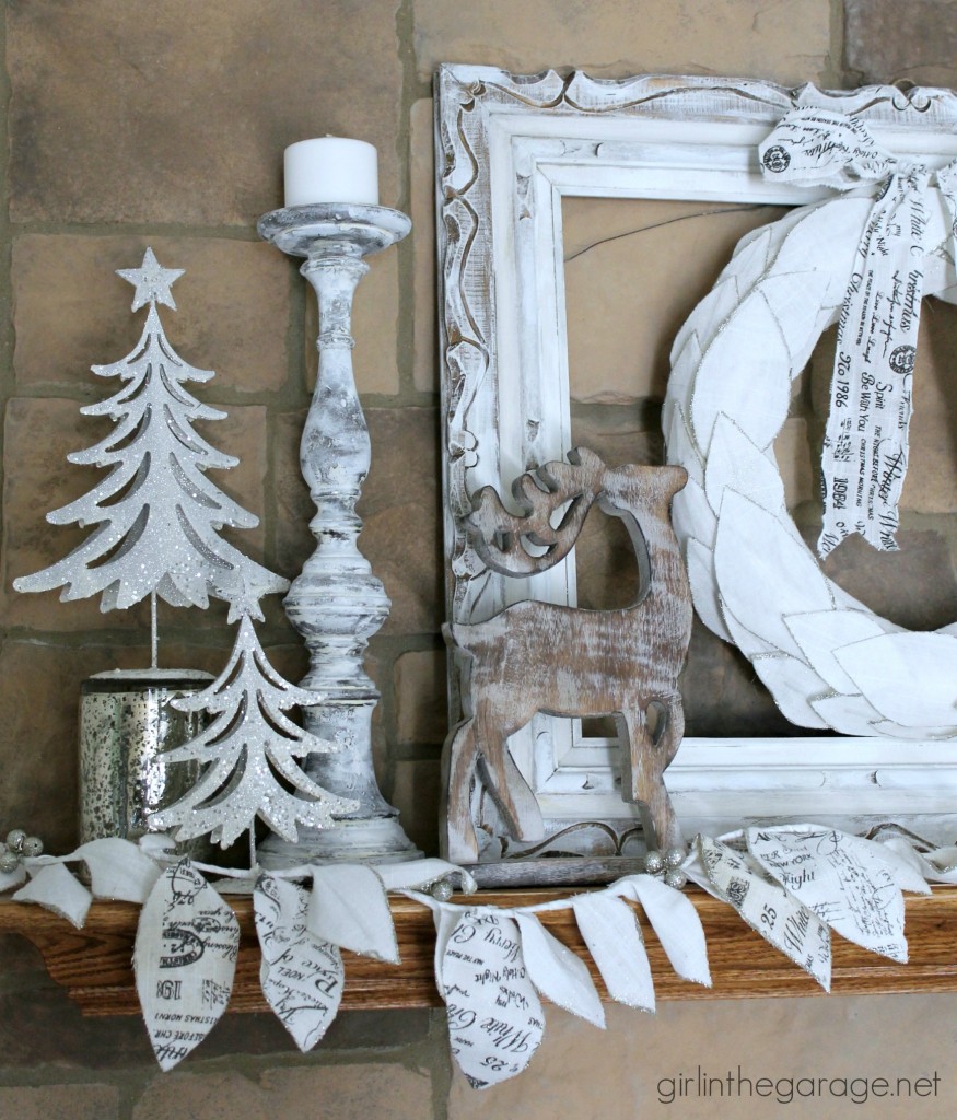 Christmas mantel decorated in white for a winter wonderland theme.