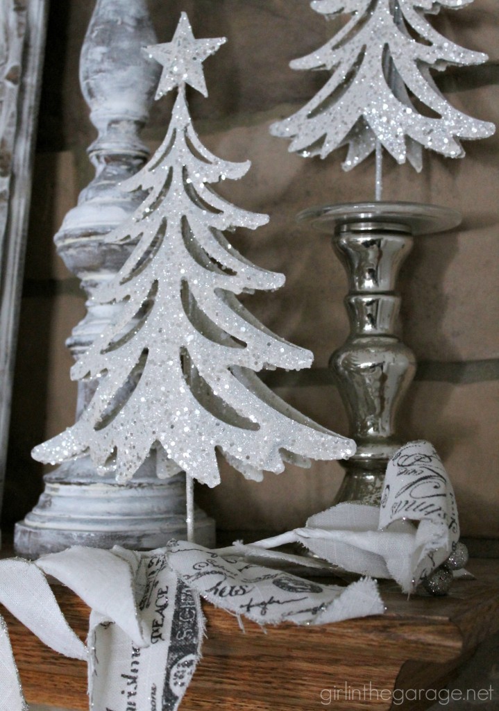 Christmas mantel decorated in white for a winter wonderland theme.