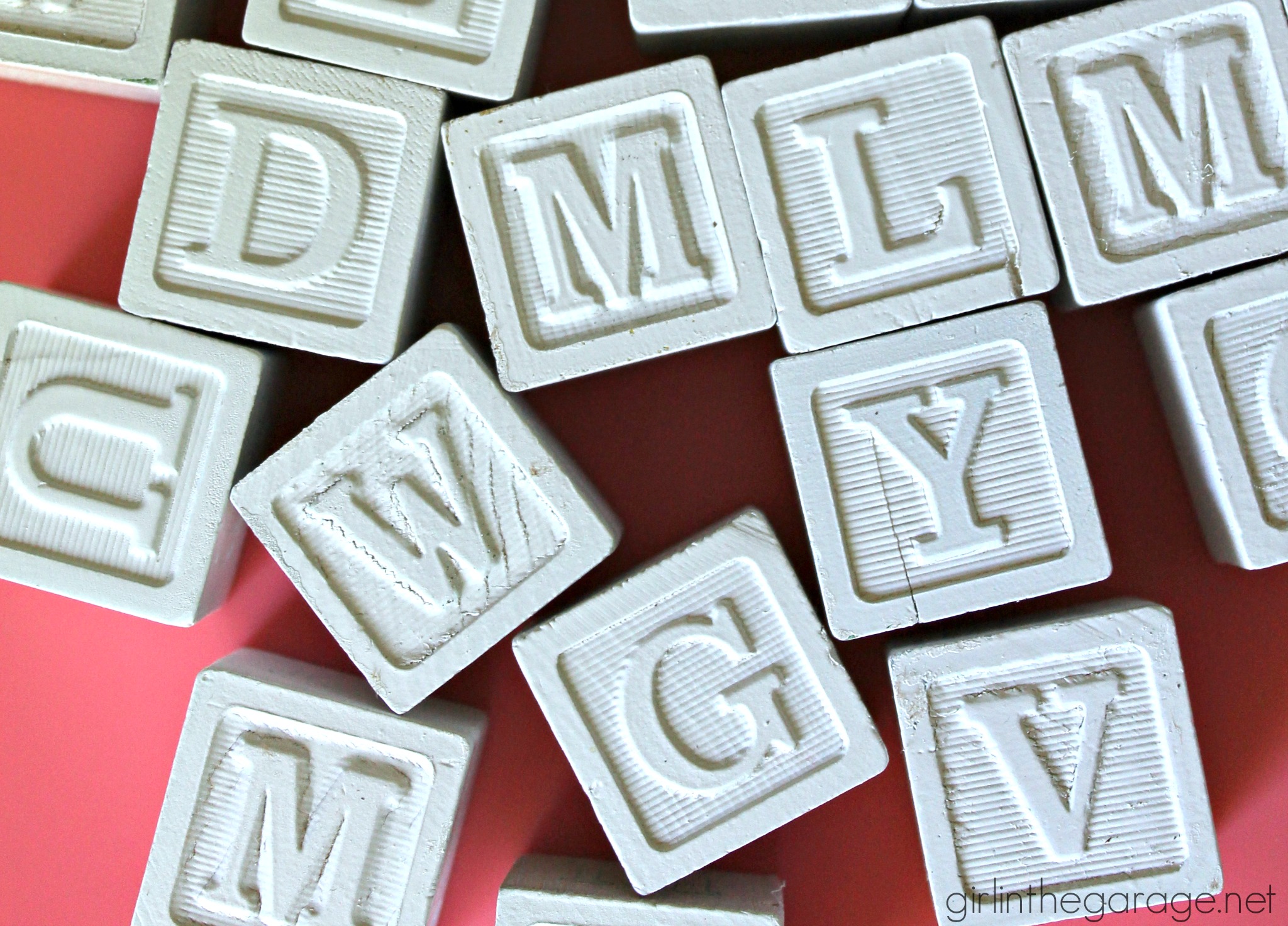Turn old baby blocks into stylish grown up decor - display meaningful messages in your home. By Girl in the Garage