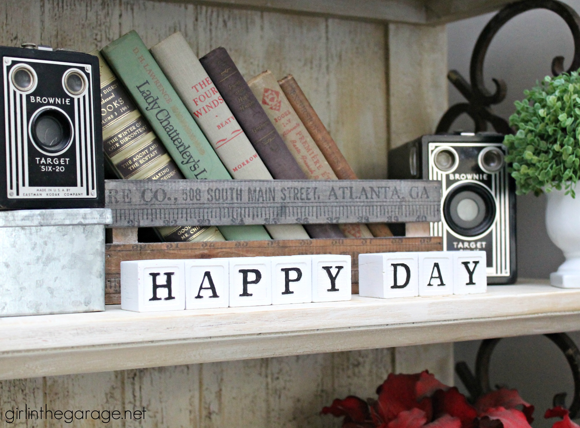 Turn old baby blocks into stylish grown up decor - display meaningful messages in your home. By Girl in the Garage