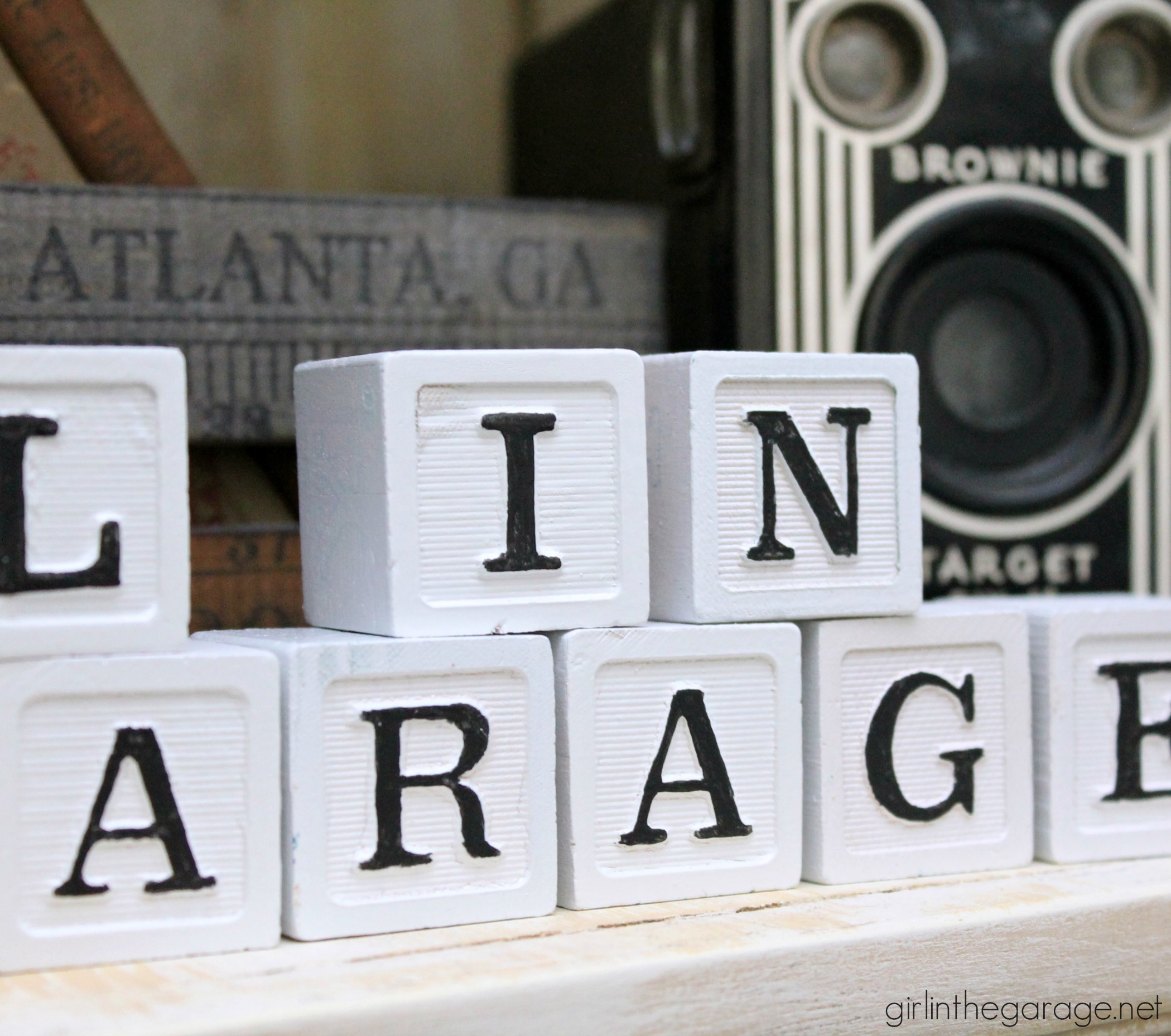 Turn old baby blocks into stylish grown up decor - display meaningful messages in your home. By Girl in the Garage