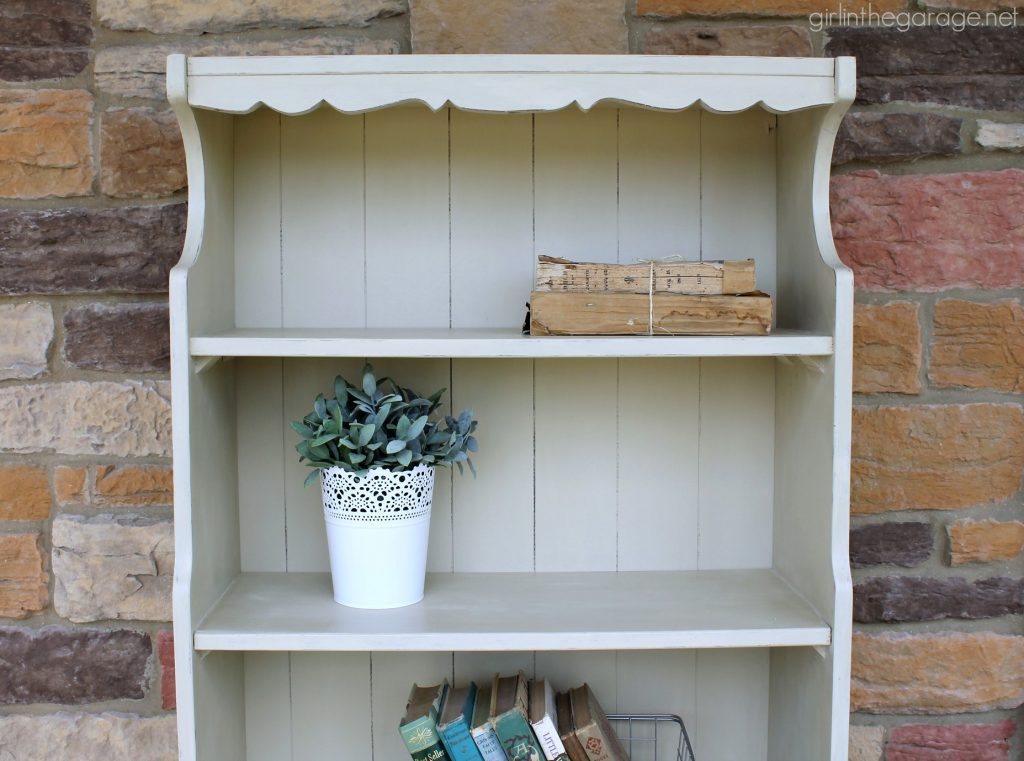 Charming farmhouse style bookcase makeover with distressed Annie Sloan Chalk Paint. Girl in the Garage