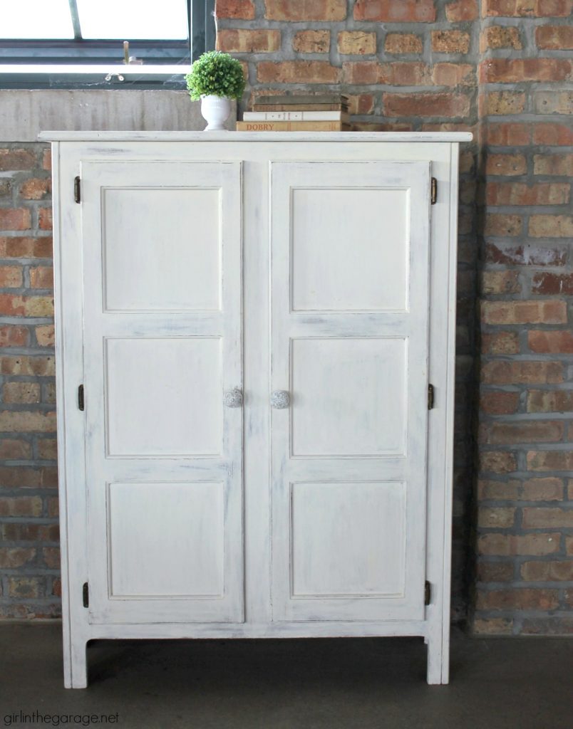 Primitive storage cabinet makeover with Chalk Paint and lightly distressed. By Girl in the Garage