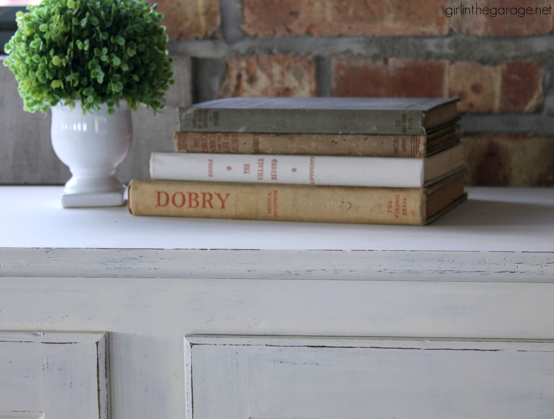 Primitive storage cabinet makeover with Chalk Paint and lightly distressed. By Girl in the Garage