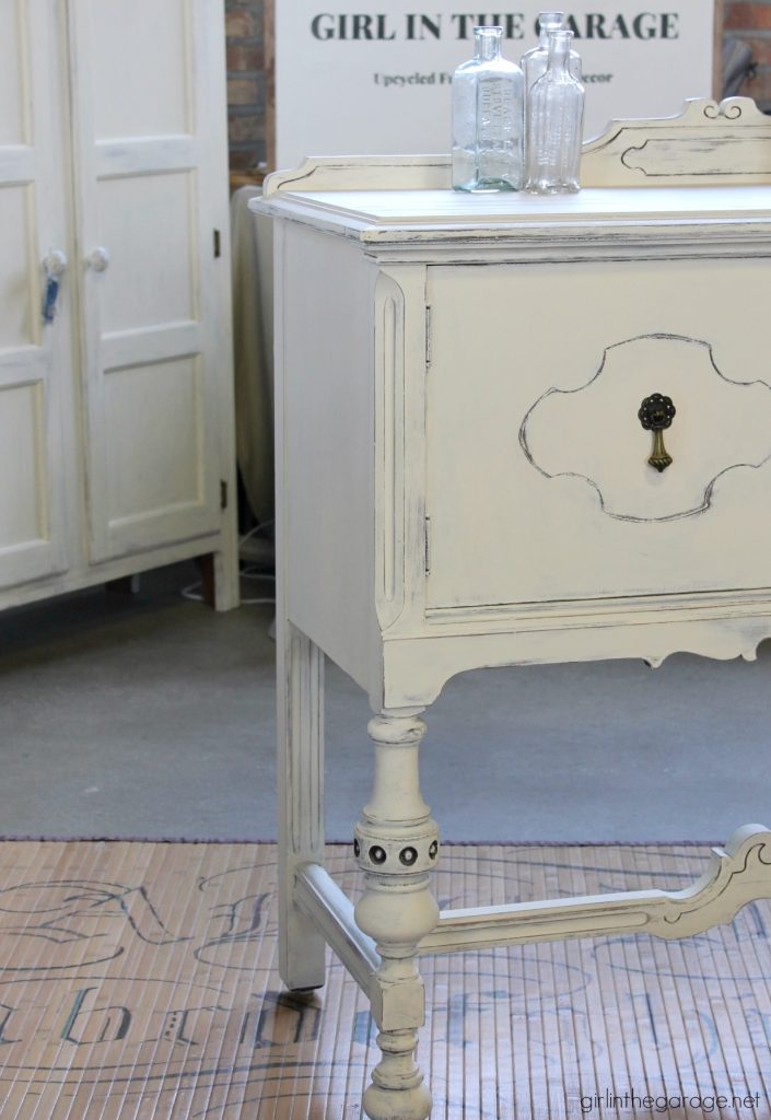 Antique sideboard makeover. How to paint a beautiful white distressed finish with Chalk Paint. By Girl in the Garage