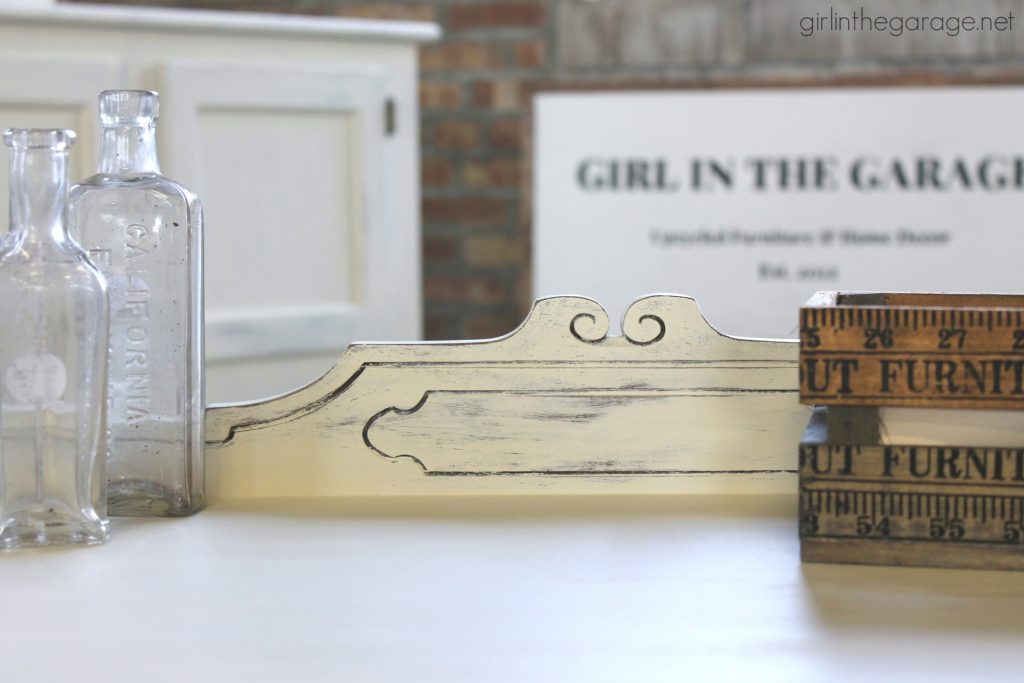 Antique sideboard makeover. How to paint a beautiful white distressed finish with Chalk Paint. By Girl in the Garage