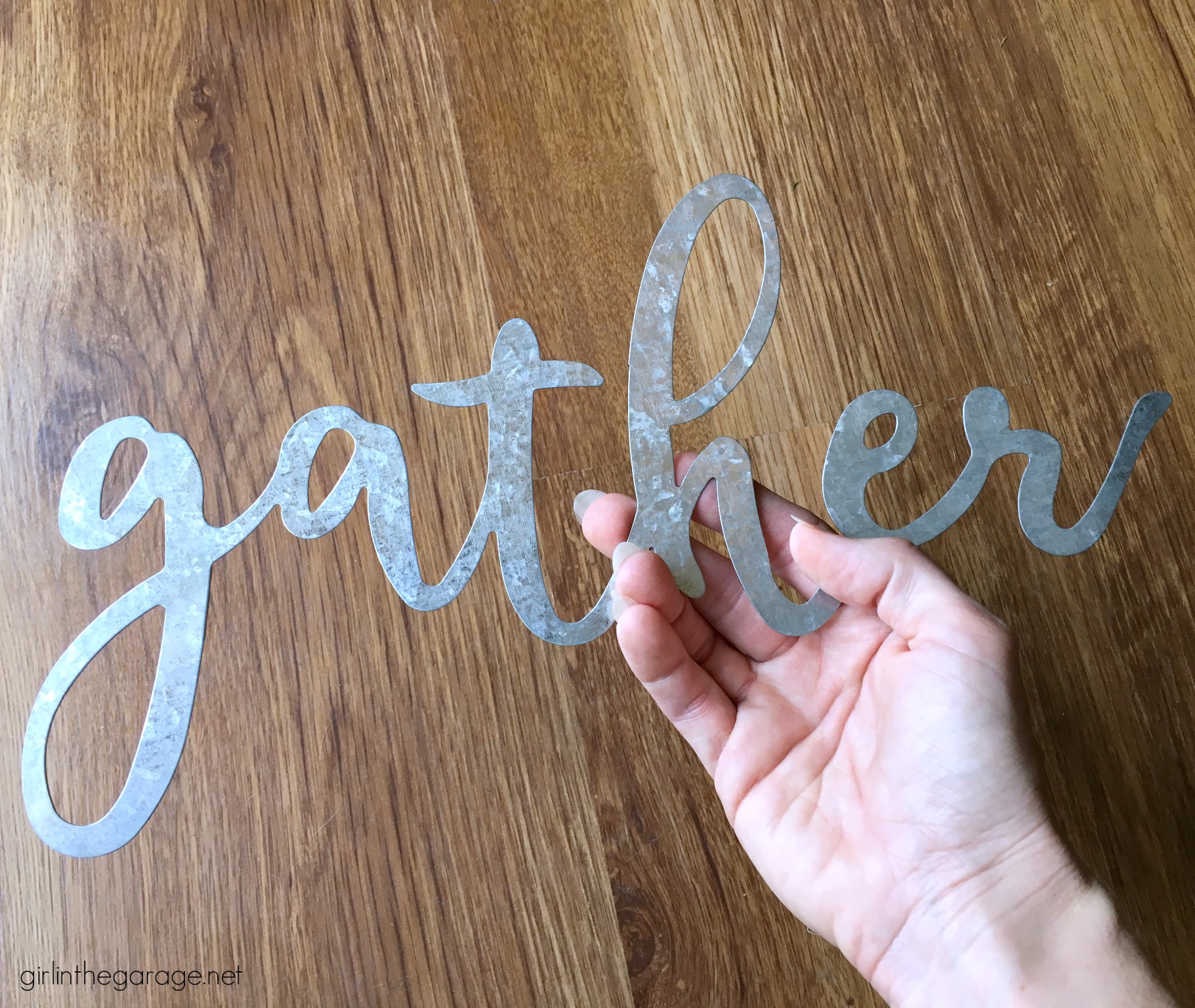 Thrifted art makeover repurposed into a planked Gather sign with farmhouse style. Easy DIY tutorial by Girl in the Garage.