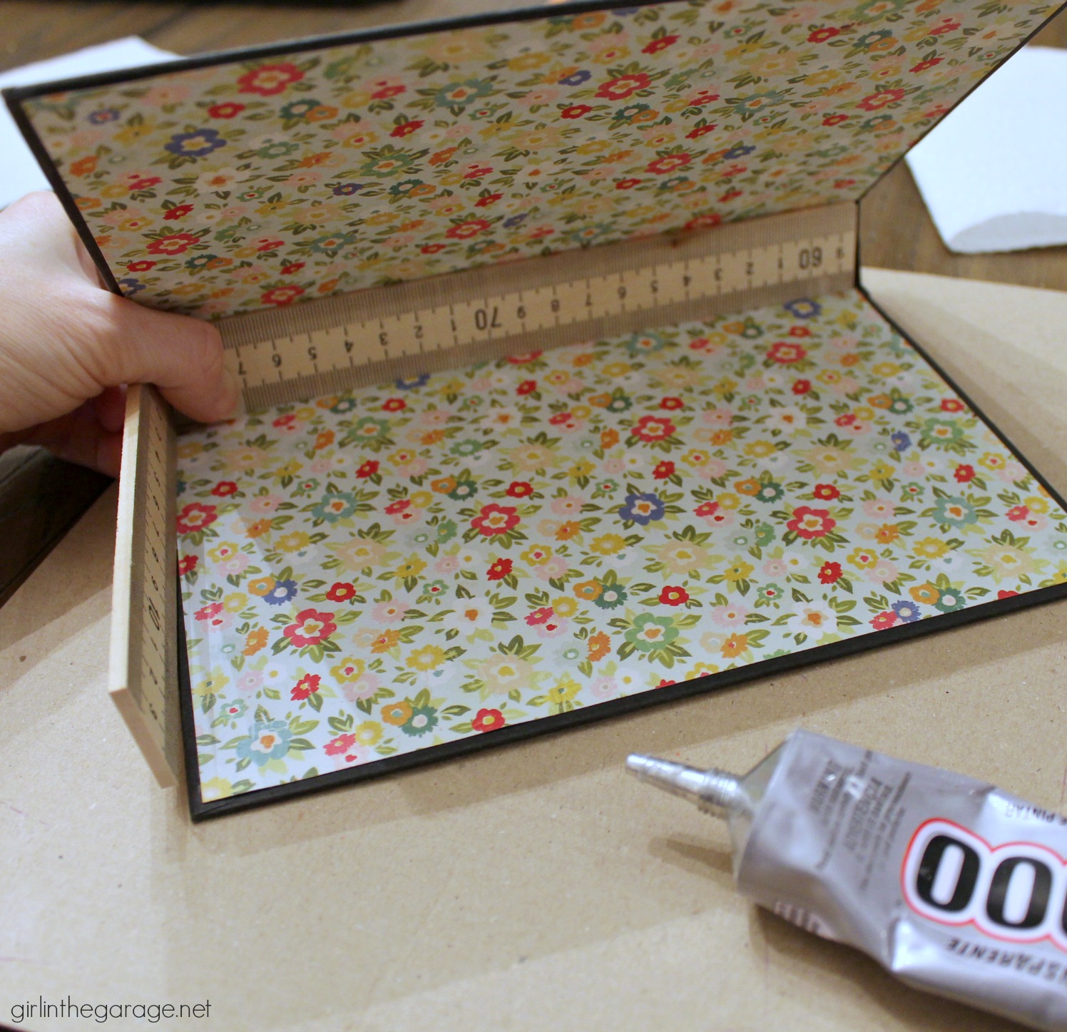 Repurposed book cover into a storage box- tutorial by Girl in the Garage