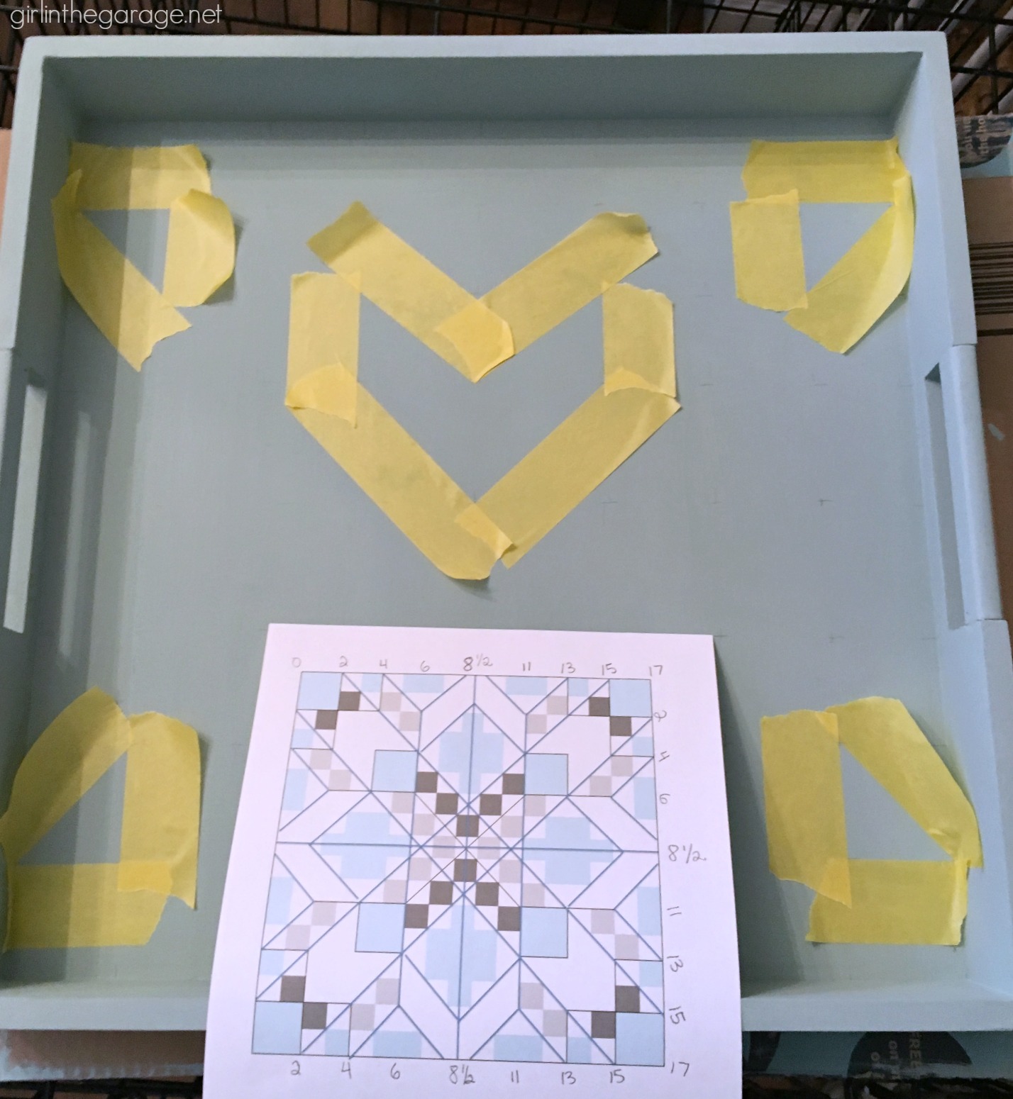 How to paint a barn quilt on a thrifted tray for a beautiful art piece. Step by step DIY tutorial by Girl in the Garage.