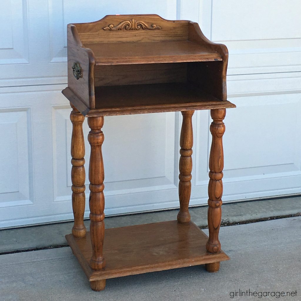 This updated telephone table was rescued from the thrift store and painted pink Chalk Paint. Now it's happy and living its best life. By Girl in the Garage