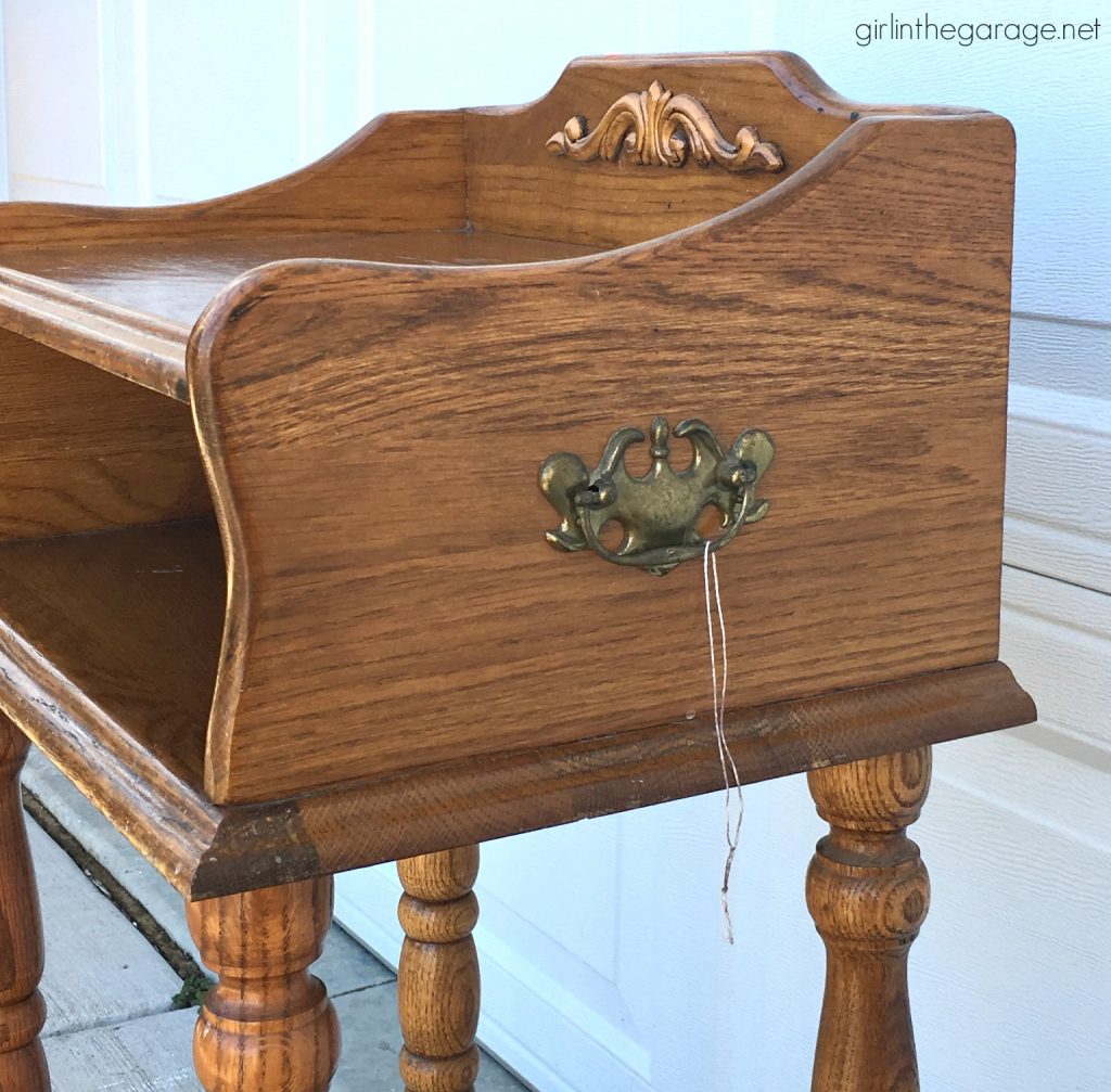 This updated telephone table was rescued from the thrift store and painted pink Chalk Paint. Now it's happy and living its best life. By Girl in the Garage